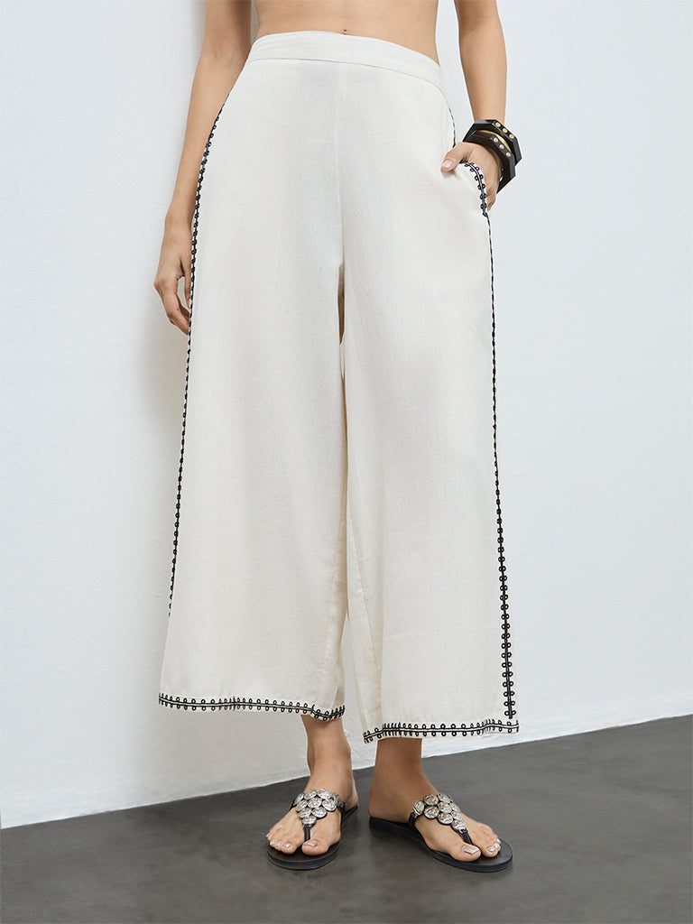 Utsa Off-White Embroidered Cotton-Blend Pants