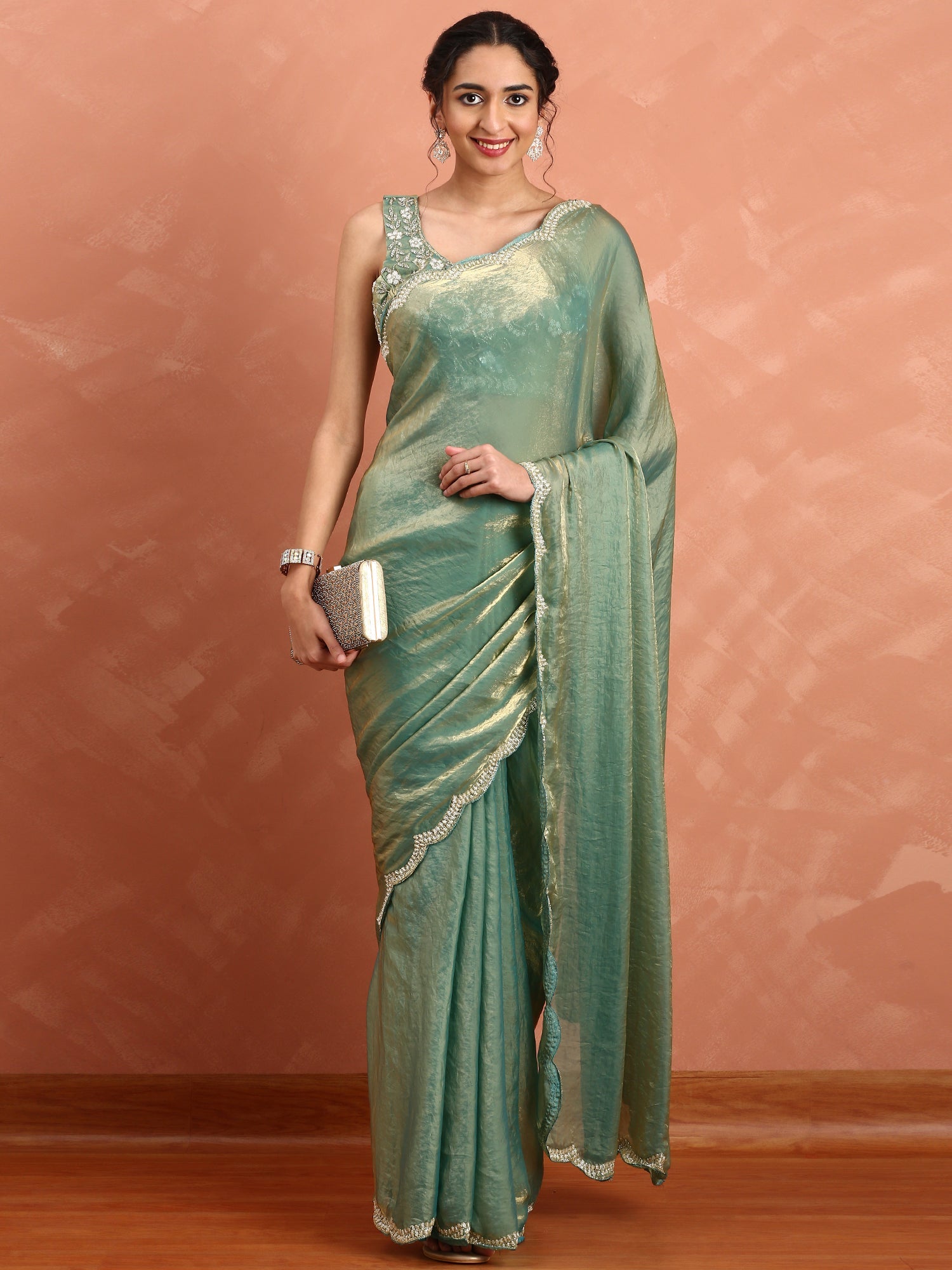 Green & gold Jimmy tissue saree with hand embroidery with ready made blouse