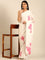 Cream satin saree with pink printed motifs with swarovski embroidery