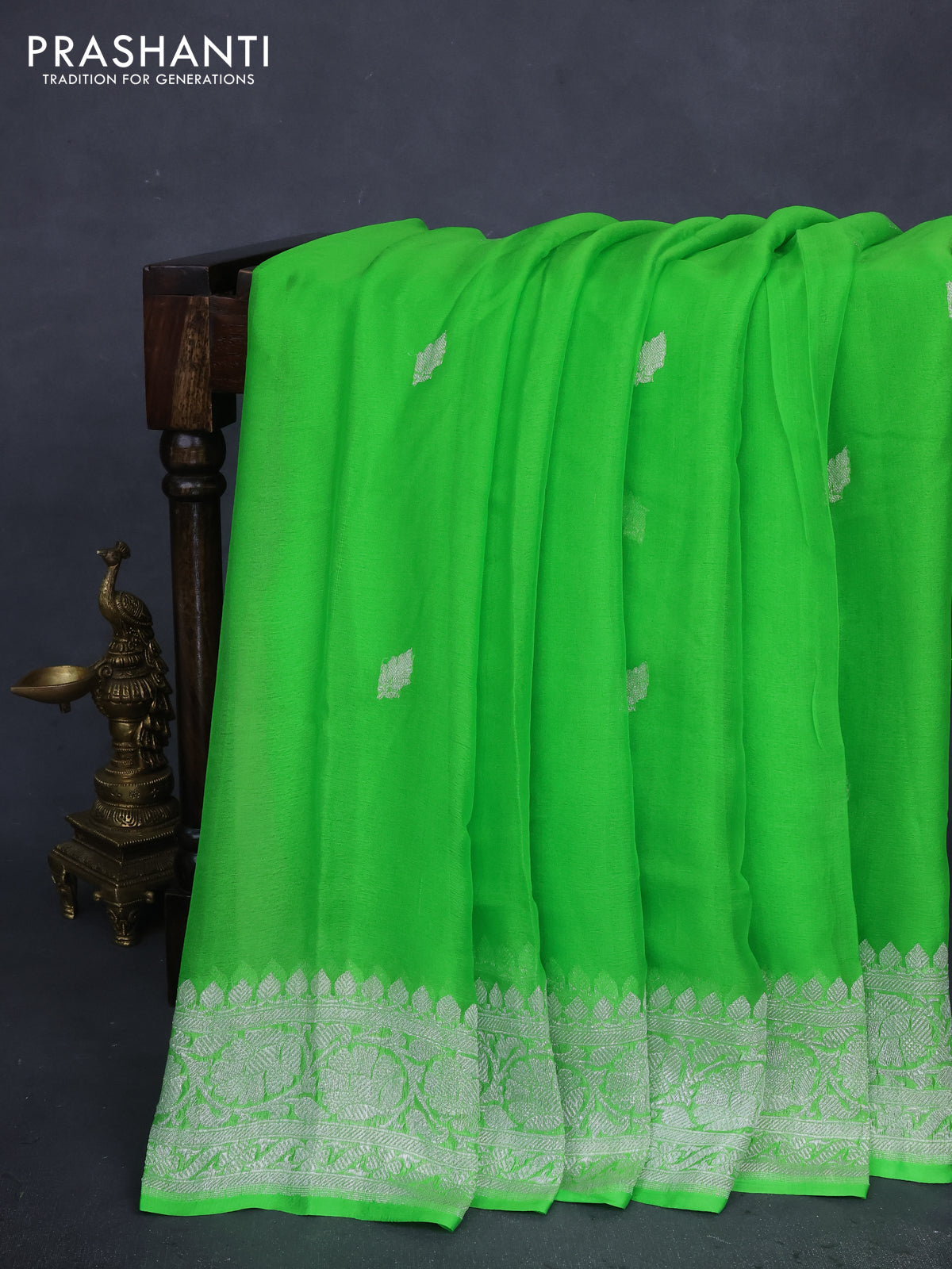 Banarasi chiffon silk saree light green with silver zari woven buttas and floral silver zari woven border