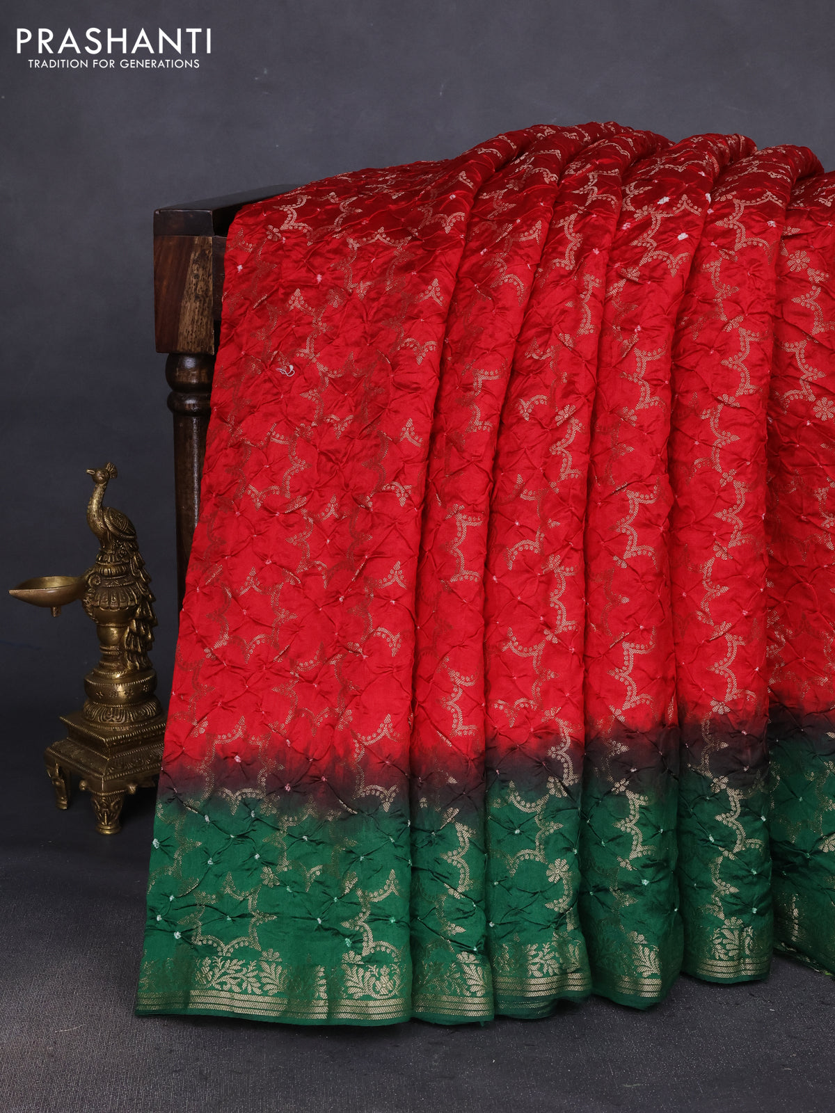 Chiniya silk saree red and green with allover bandhani prints & zari weaves and zari woven border