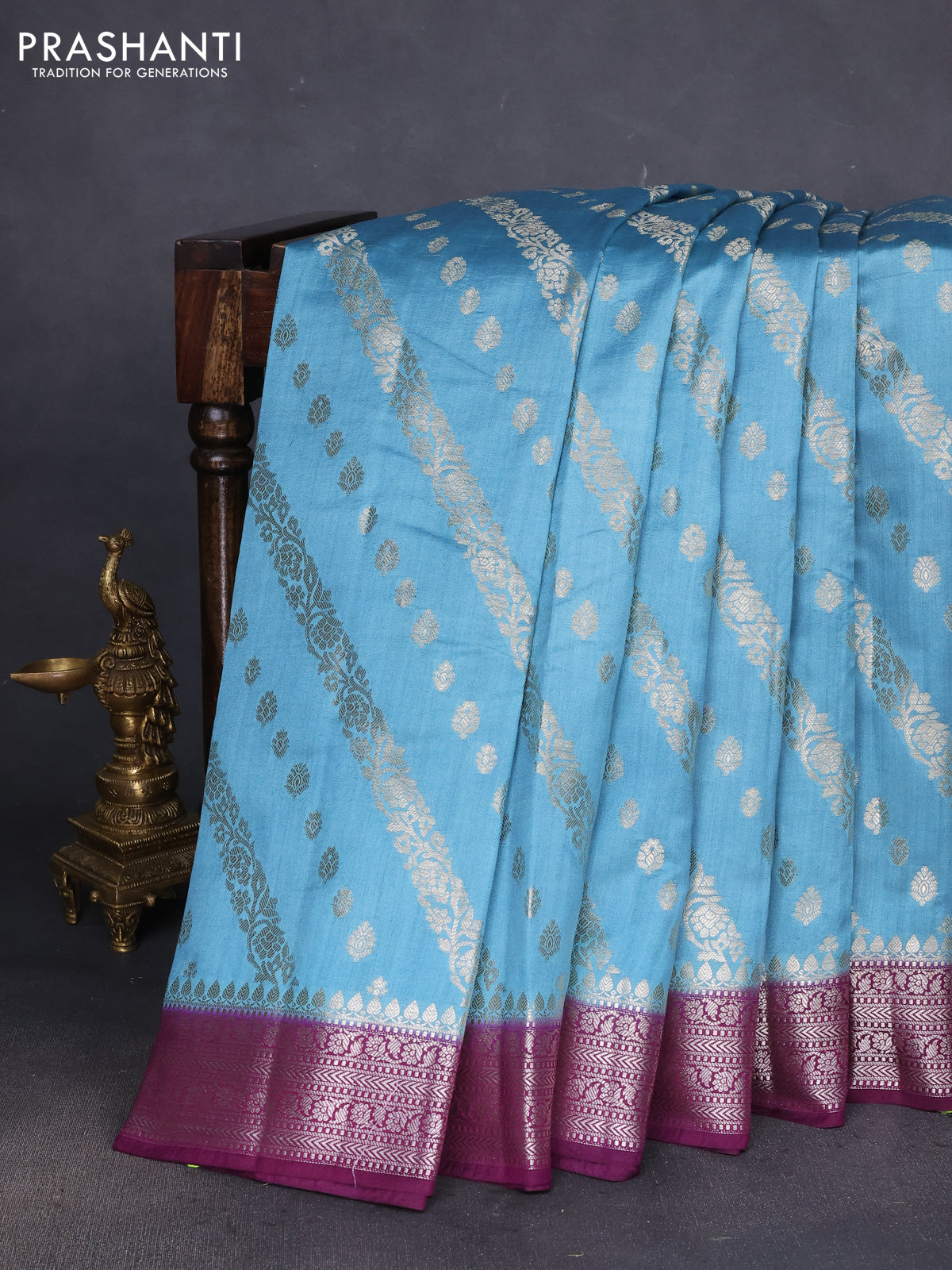 Chiniya silk saree pastel blue and wine shade with allover zari weaves and zari woven border