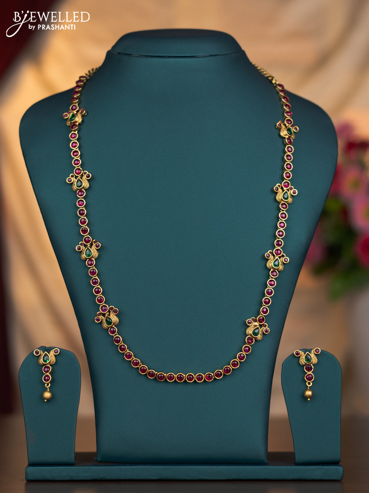 Antique haaram lakshmi with kemp stones and golden beads hangings