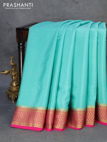 Pure mysore silk saree teal blue and pink with plain body and zari woven border