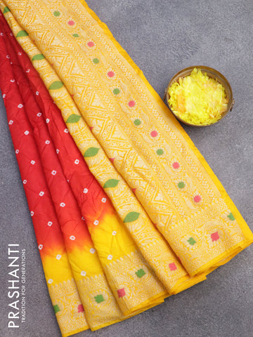 Bandhani saree red and mango yellow with allover bandhani prints and banarasi style border