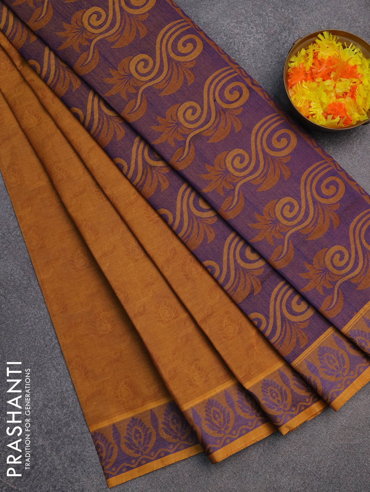 Coimbatore cotton saree dark mustard and blue with allover self emboss and thread woven border