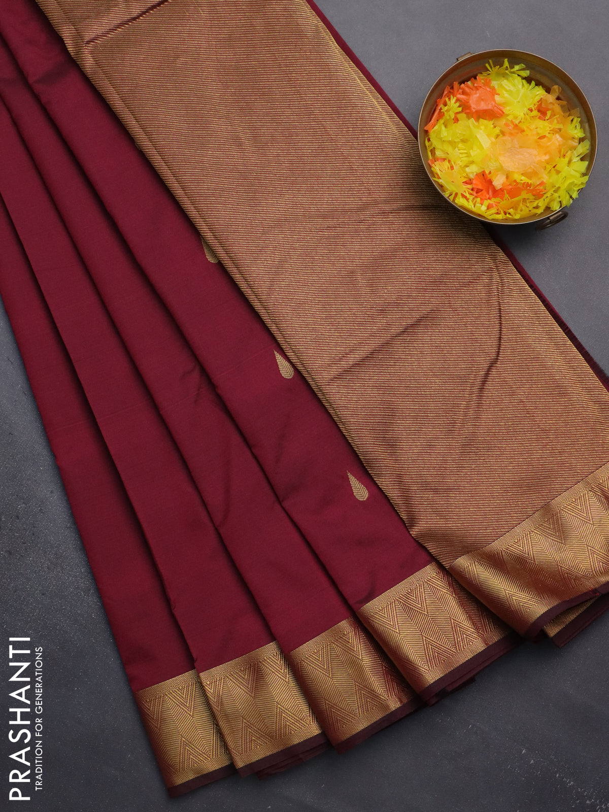 Arani semi silk saree maroon shade with zari woven thilak buttas and zari woven border