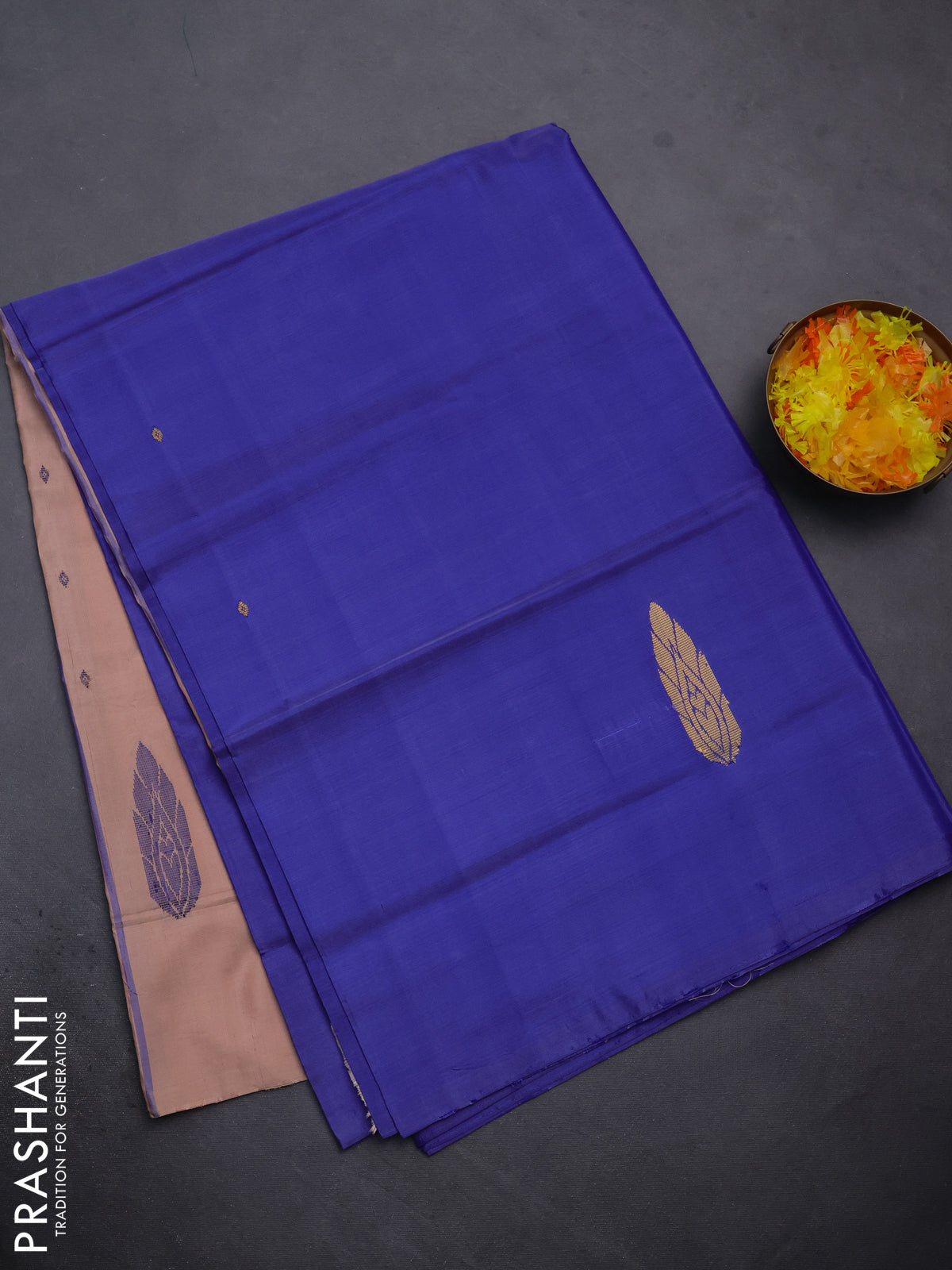 Banana pith saree blue and pastel peach shade with thread woven buttas in borderless style