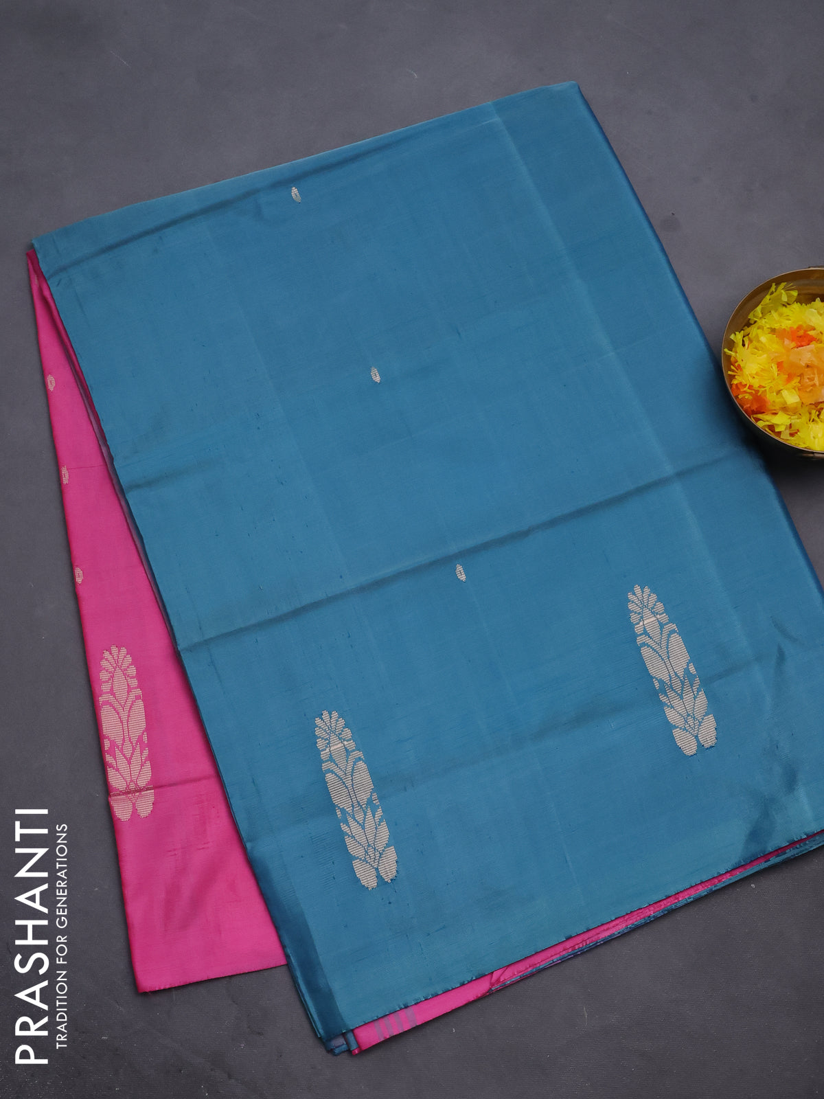 Banana pith saree teal green and pink with thread woven buttas in borderless style