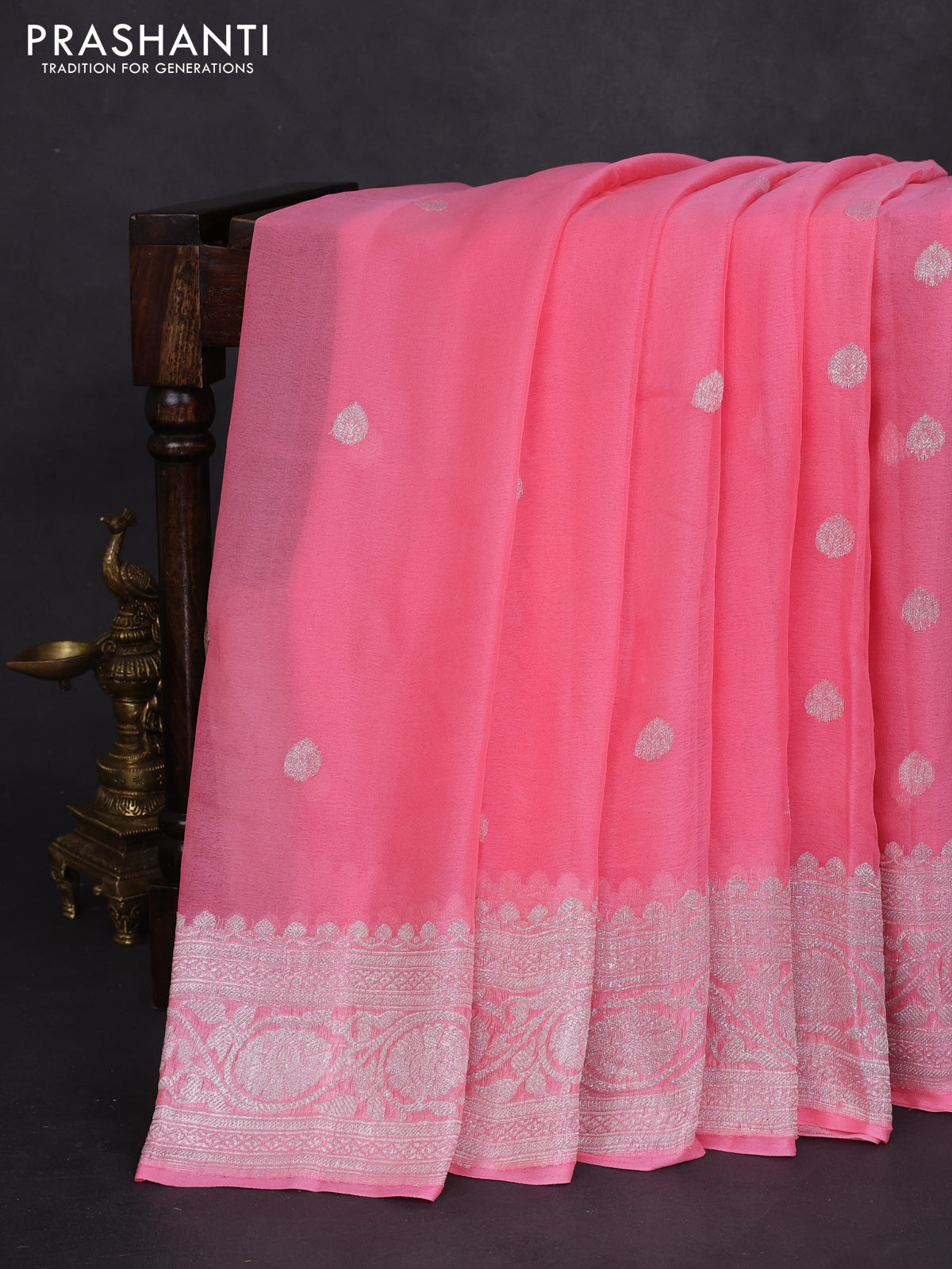Banarasi chiffon silk saree peach pink with silver zari woven buttas and silver zari woven border