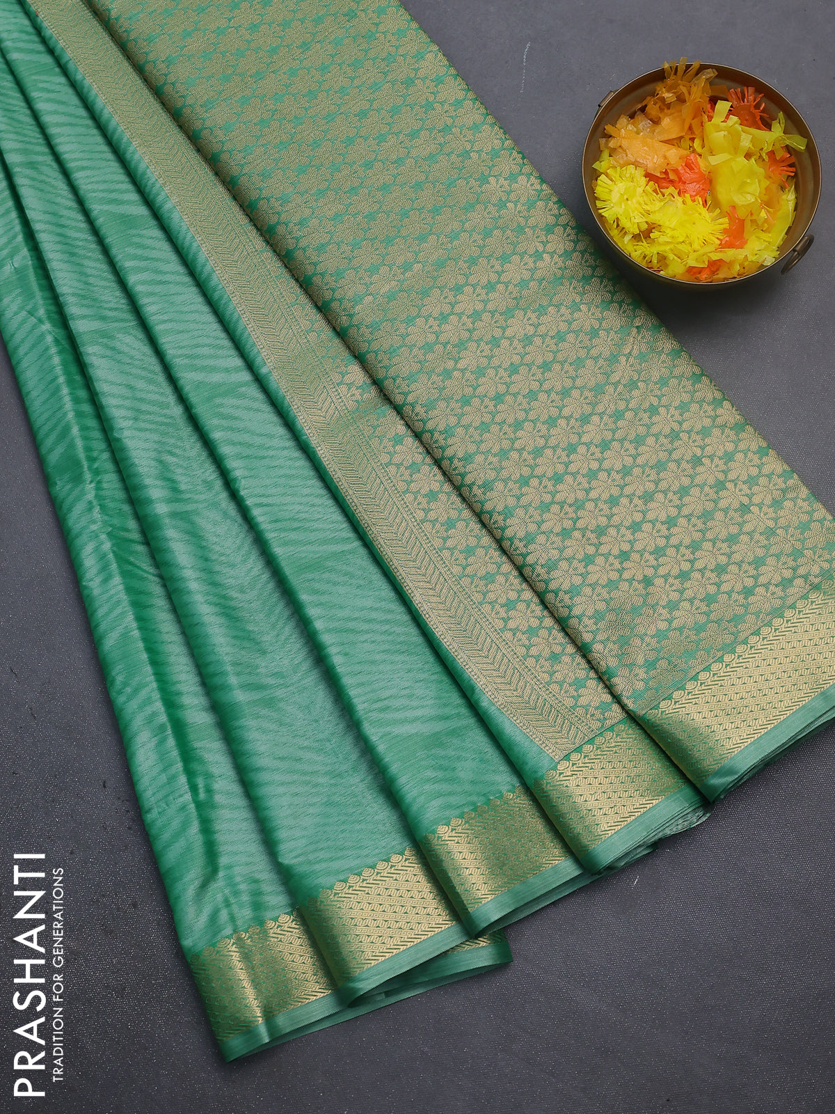 Bangalori semi silk saree teal green with allover ikat weaves and zari woven border