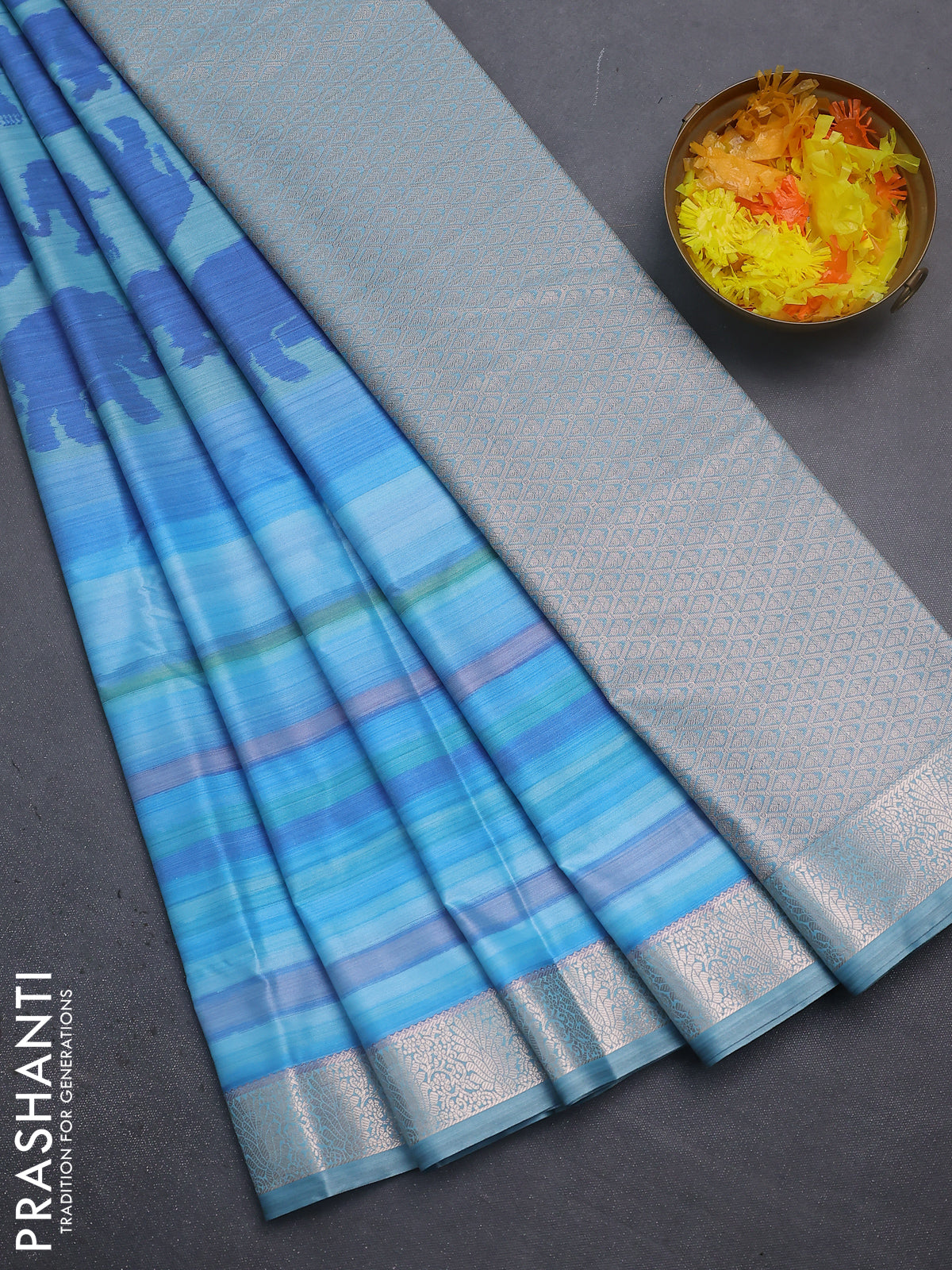 Bangalori semi silk saree pastel blue with allover elephant butta ikat weaves and zari woven border