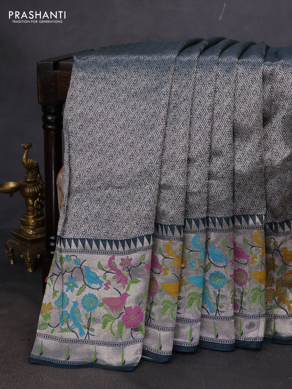 Banarasi semi raw silk saree peacock blue with allover silver woven brocade weaves and floral design paithani border