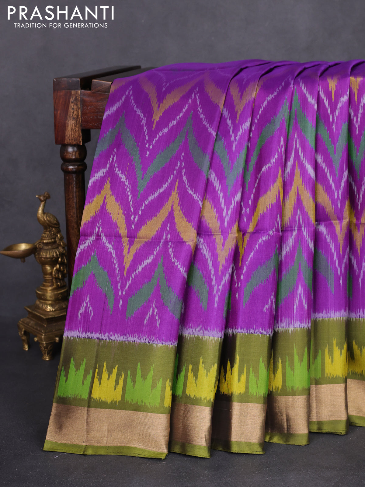 Ikat soft silk saree purple and mehendi green with allover ikat weaves and temple design zari woven border
