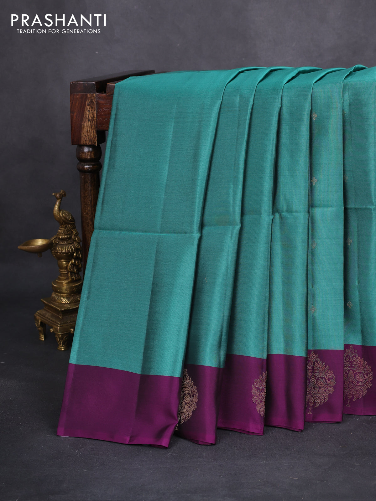 Kanchipuram soft silk saree teal green shade and purple with zari woven buttas and zari woven butta border