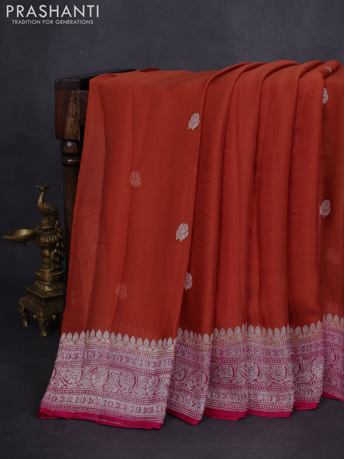 Banarasi chiffon silk saree rust shade and magenta pink with silver zari woven buttas and floral silver zari woven border