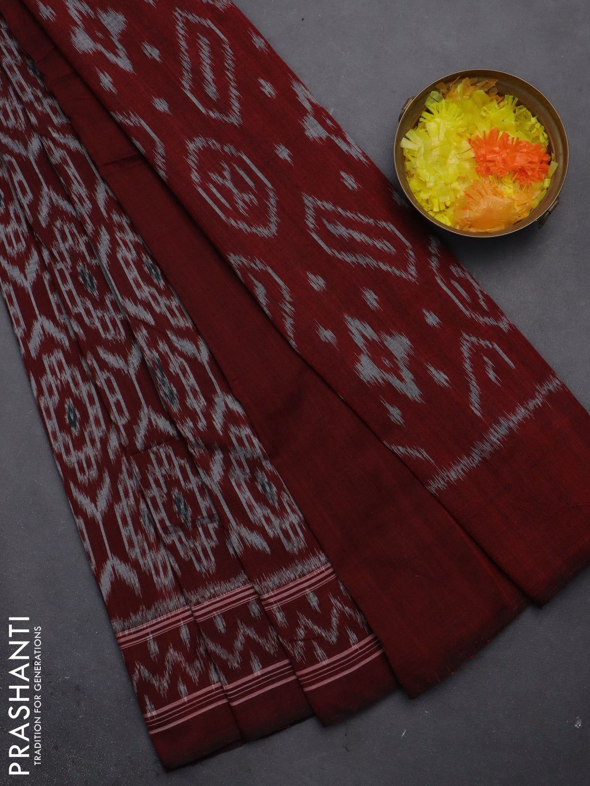 Ikat cotton saree maroon with allover ikat weaves and simple border