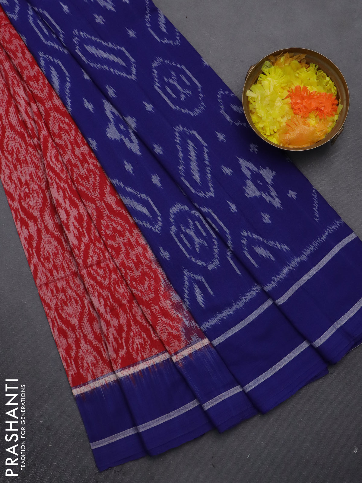 Ikat cotton saree red and blue with allover ikat weaves and simple border