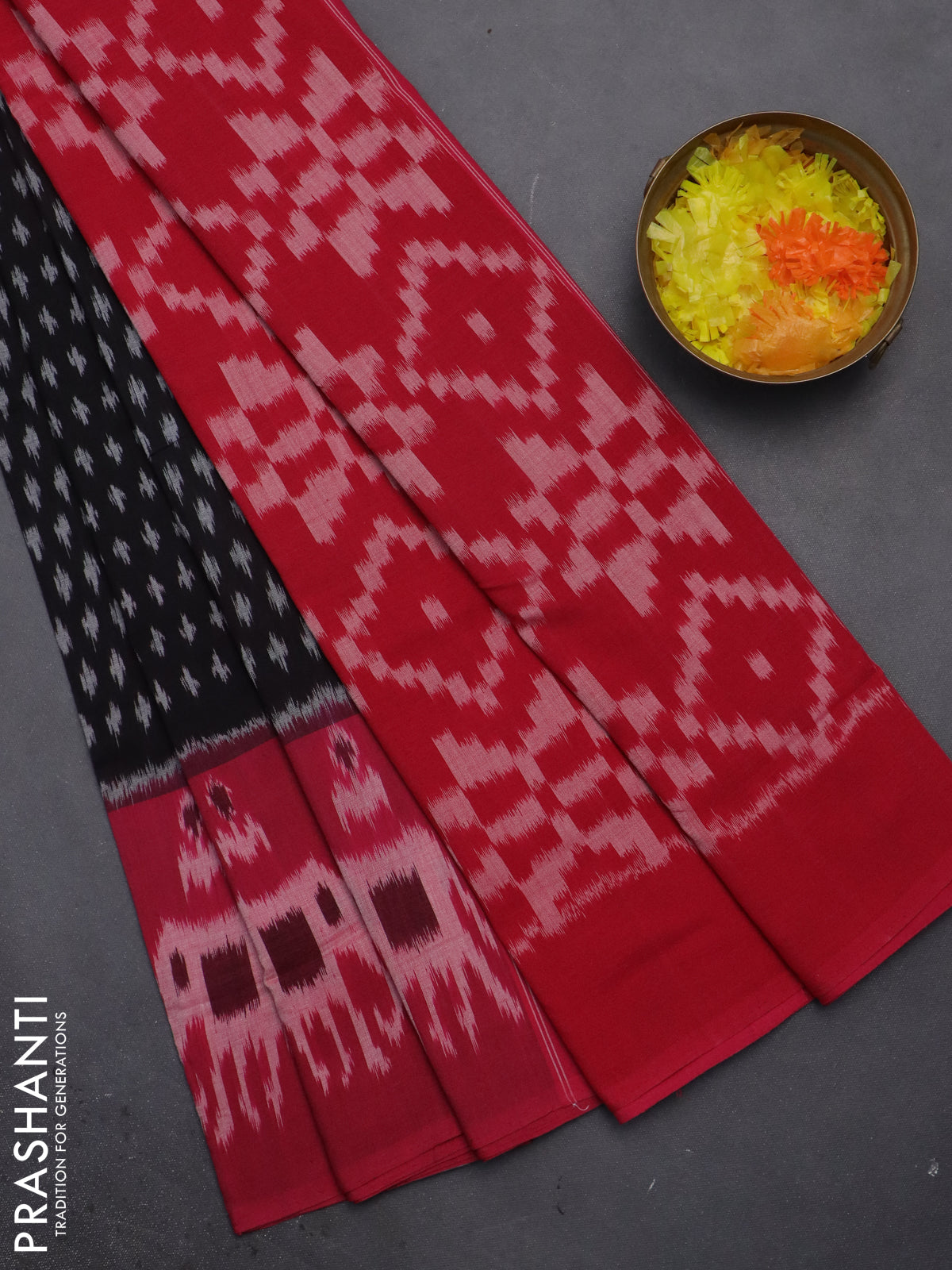 Ikat cotton saree black and pink with allover ikat butta weaves and long ikat border