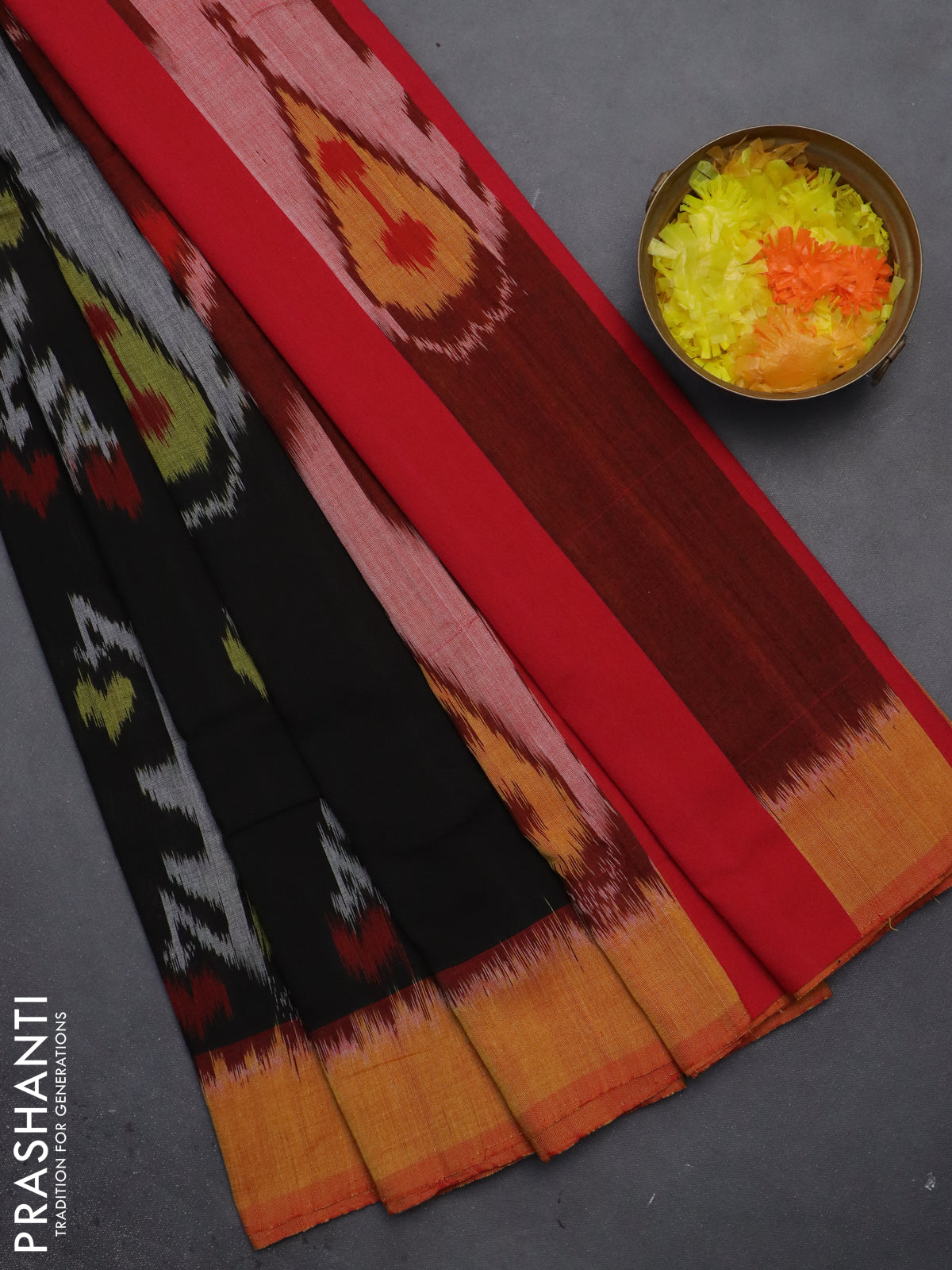 Ikat cotton saree black with allover ikat weaves and ganga jamuna border