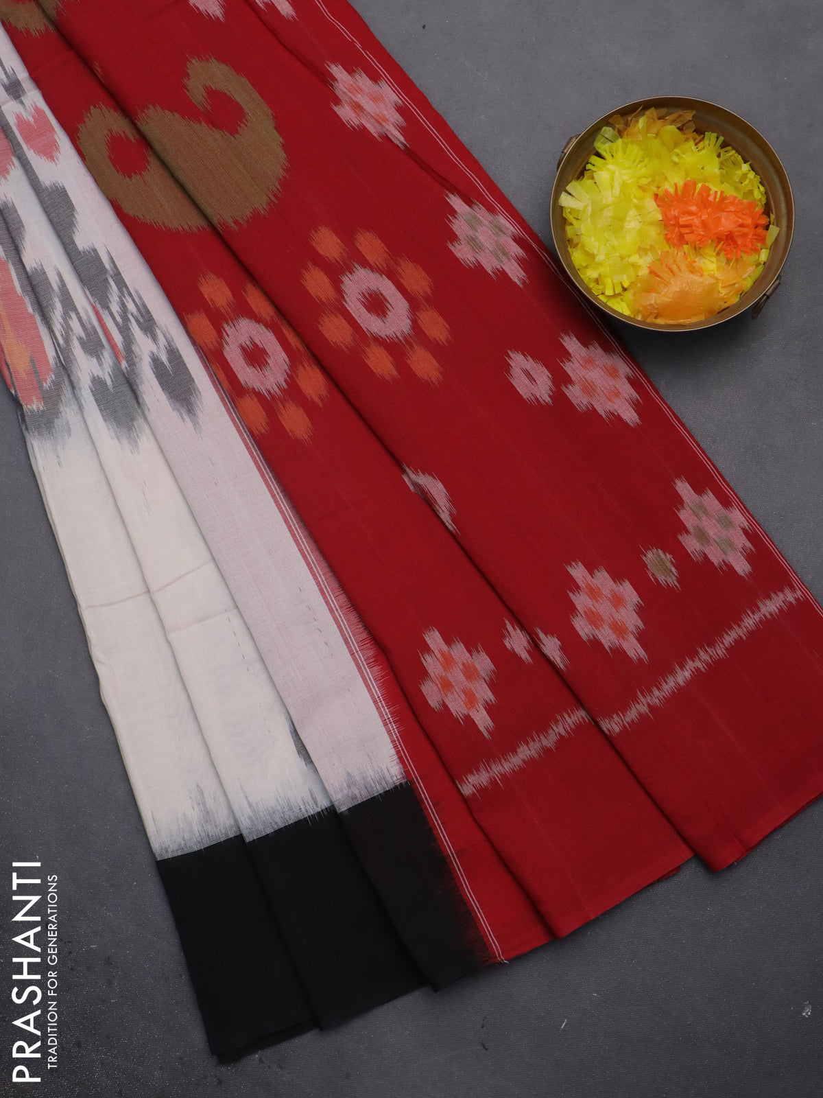 Ikat cotton saree off white with allover ikat weaves and ganga jamuna border