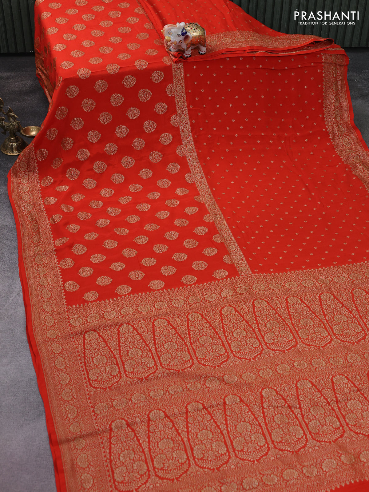 Banarasi crepe saree orange with half & half style and woven border