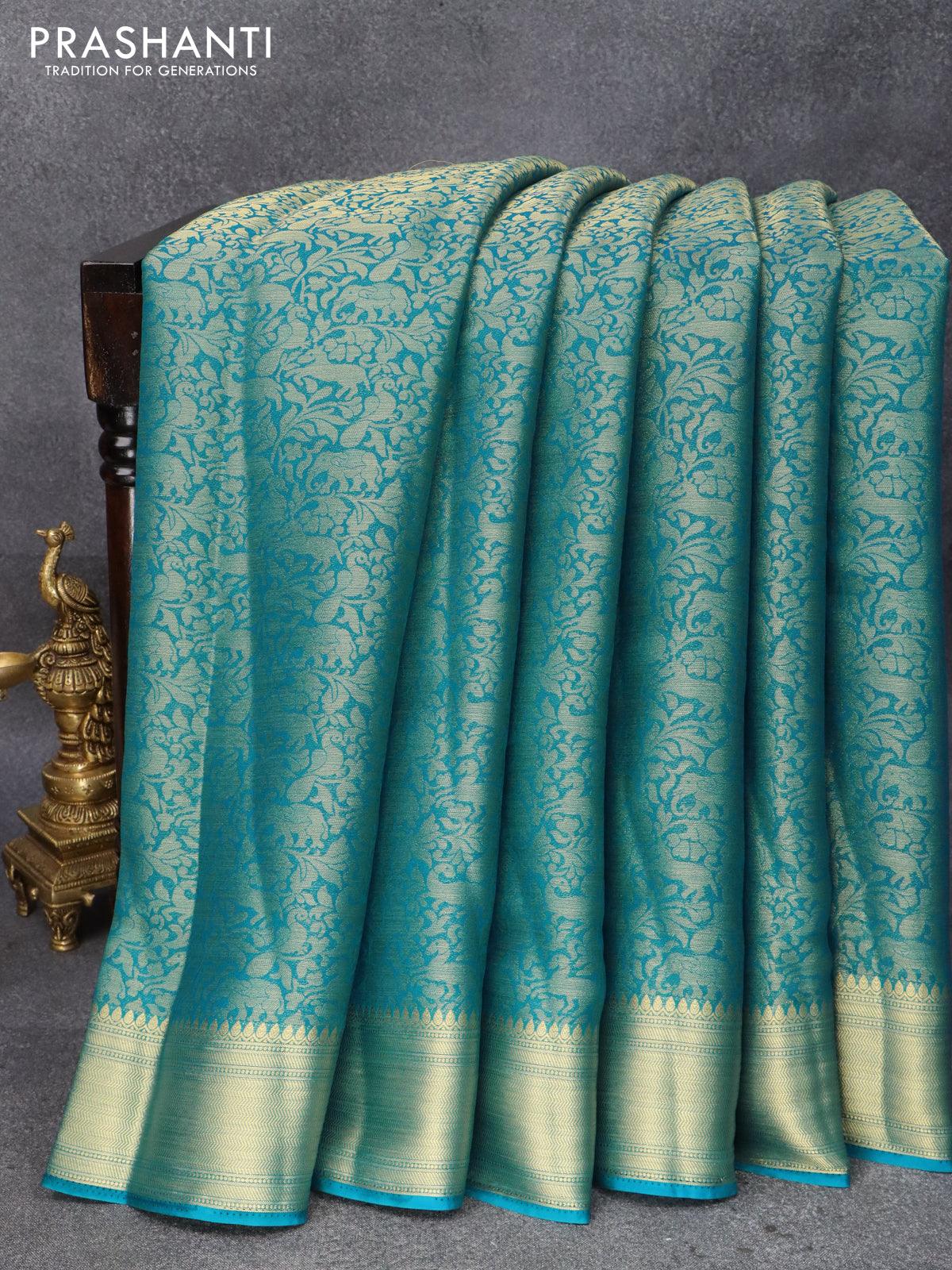 Art chiffon saree cs blue with allover zari woven brocade weaves and zari woven border