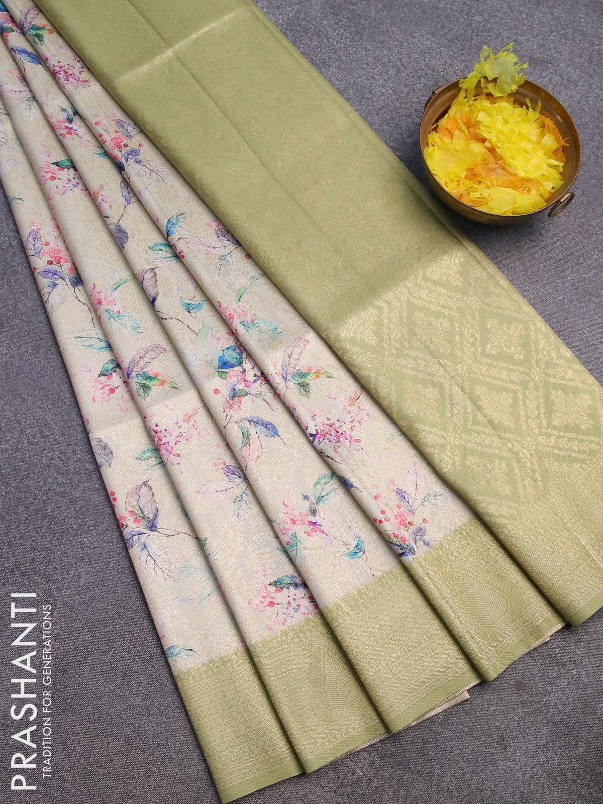 Banarasi softy silk saree mild pastel green and pastel green with allover zari weaves & floral digital prints and zari woven border