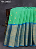 Pure gadwal silk saree green shade and cs blue with allover zari woven buttas and long zari woven border