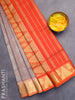 Silk cotton saree dual shade of greyish pink and orange with allover self emboss jaquard and zari woven border
