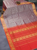 Silk cotton saree dual shade of greyish pink and orange with allover self emboss jaquard and zari woven border
