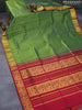 Silk cotton saree dual shade of green and kumkum red with allover self emboss jaquard and annam zari woven border