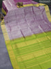 Silk cotton saree dual shade of purple and light green with allover self emboss jaquard and zari woven border