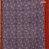 Muslin cotton saree dark blue and rustic orange with allover floral prints and small zari woven border
