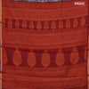 Muslin cotton saree dark blue and rustic orange with allover floral prints and small zari woven border