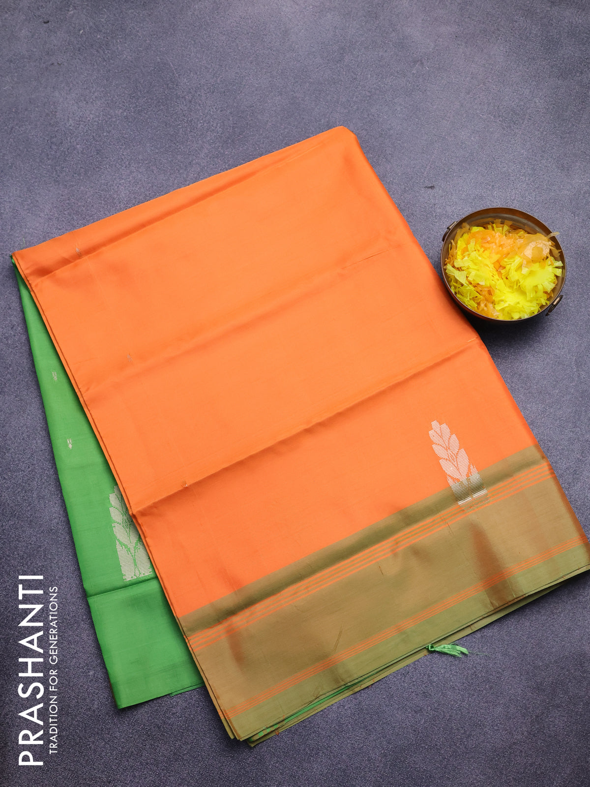 Banana pith saree orange and parrot green with thread woven buttas in borderless style