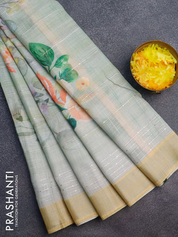 Linen cotton saree pista green and yellow with allover floral prints & sequin work and silver zari woven border