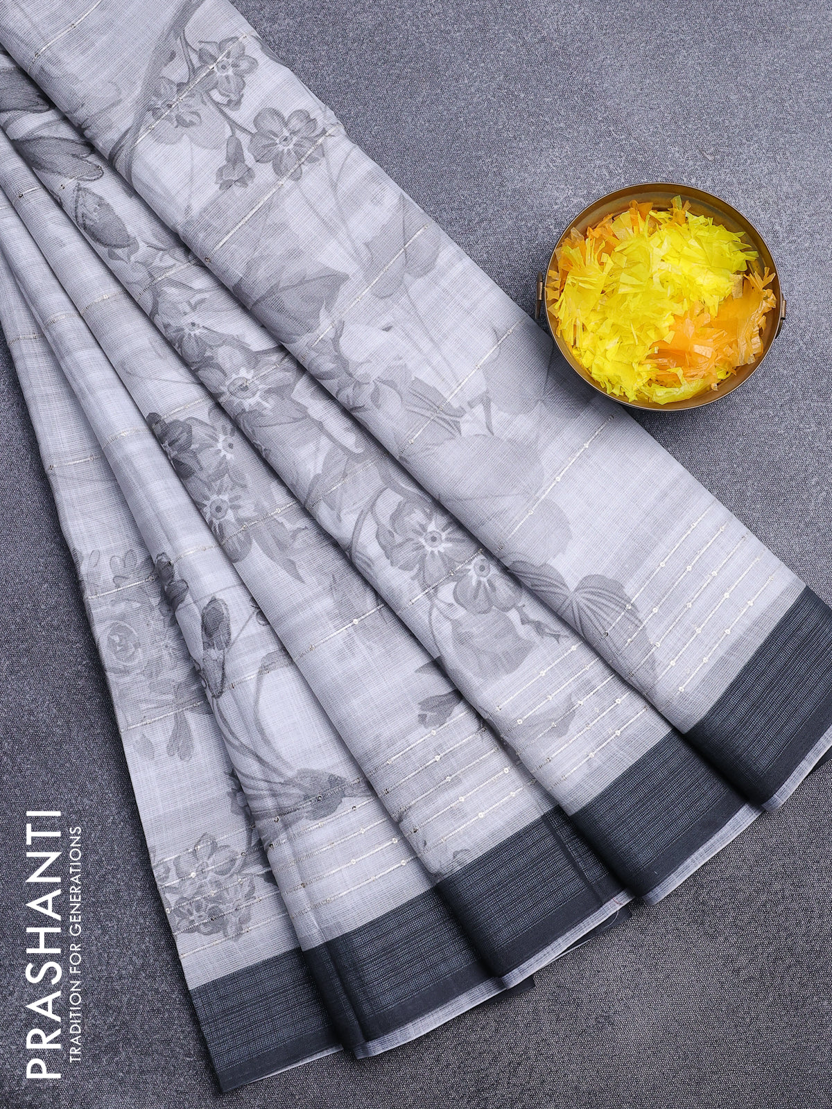 Linen cotton saree off white and elephnat grey with allover floral prints & sequin work and silver zari woven border