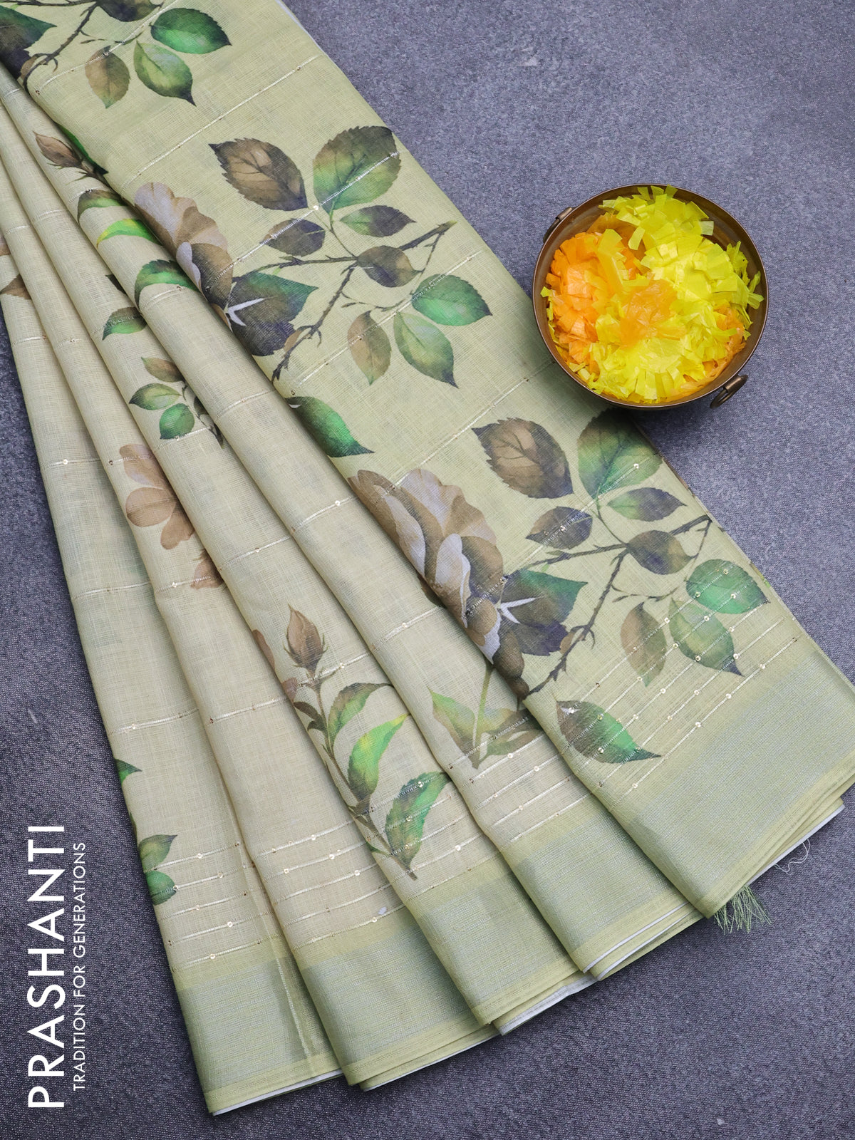 Linen cotton saree pista green with allover floral prints & sequin work and silver zari woven border