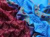 Silk cotton block printed saree maroon and cs blue with allover prints and zari woven border