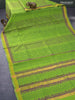 Silk cotton block printed saree light green with allover prints and zari woven border