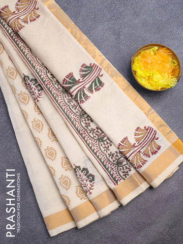 Silk cotton block printed saree cream with butta prints and zari woven border
