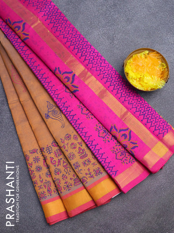 Silk cotton block printed saree mustard shade and pink with allover prints and zari woven border