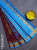 Silk cotton block printed saree maroon and light blue with allover prints and zari woven border