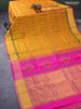 Silk cotton block printed saree mustard yellow and pink with allover prints and zari woven border