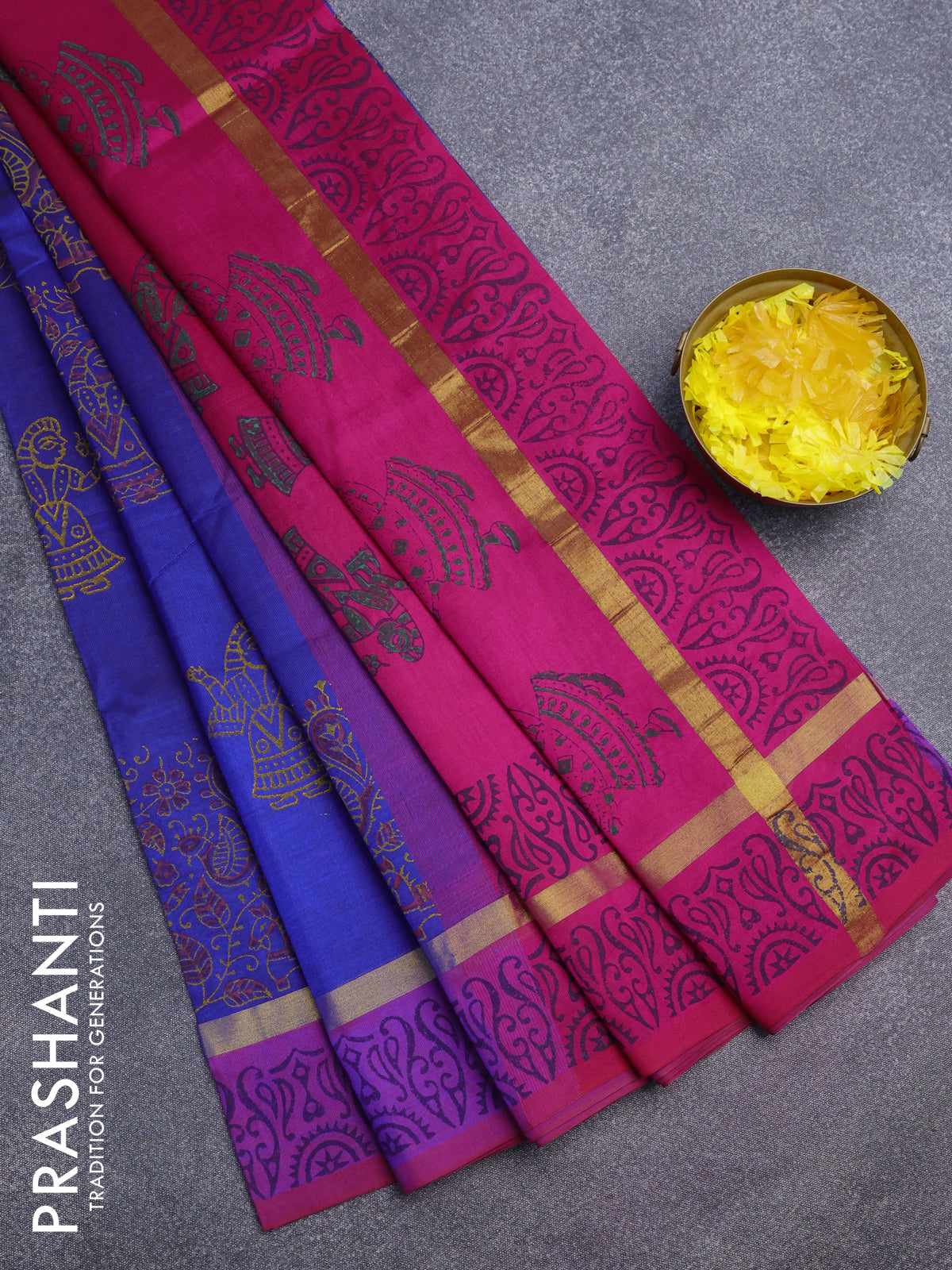 Silk cotton block printed saree blue and pink with allover prints and zari woven simple border