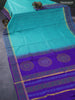 Silk cotton block printed saree teal blue and blue with allover prints and zari woven simple border
