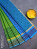 Silk cotton block printed saree green and cs blue with paisley butta prints and zari woven simple border