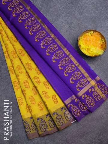 Silk cotton block printed saree yellow and violet with paisley butta prints and zari woven simple border