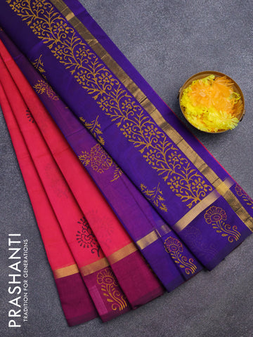 Silk cotton block printed saree dual shade of pinkish orange and purple with floral butta prints and zari woven simple border